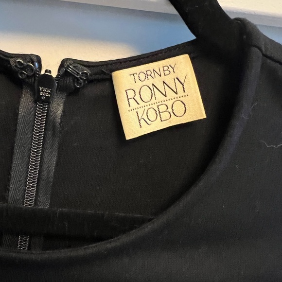 Torn by Ronny Kobo peplum black mini dress. Bought in NYC, and work only twice. - Picture 2 of 3